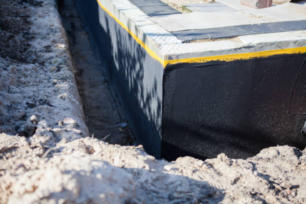 Professional Waterproofing technician working in Wilmer, AL